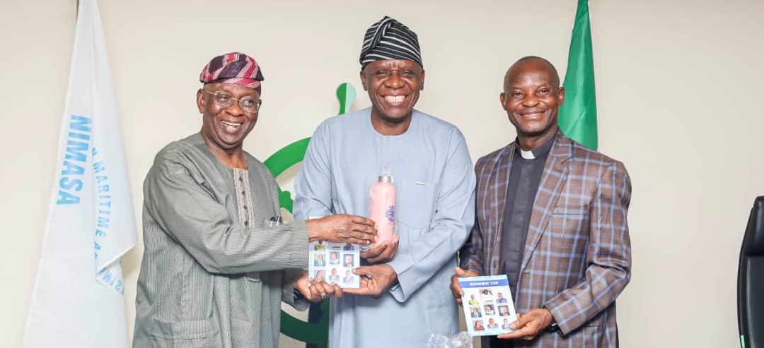 L-R: Chairman, Management Committee of Mission to Seafarers (MtS) Lagos, Chief Adebayo Sarumi, OON; making a presentation to the Executive Director, Operations, Nigerian Maritime Administration and Safety Agency, NIMASA, Engr. Fatai Adeyemi; alongside Chaplain, at the Mission to Seafarers Lagos, The Venerable Raphael O. Gbenie; during a courtesy visit by the Chairman, Management Committee, Mission to Seafarers, Lagos to the headquarters of NIMASA in Lagos.